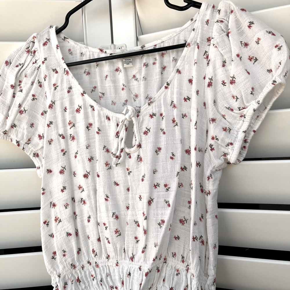 white and red floral blouse